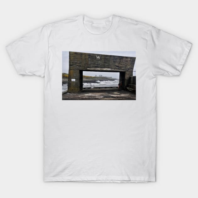 Craster Sea Wall View of Dunstanburgh Castle, Northumberland, UK T-Shirt by richflintphoto